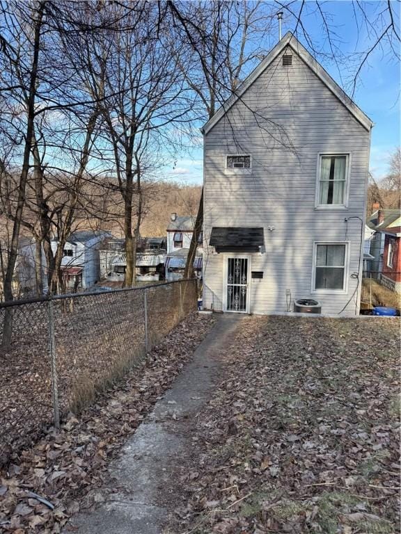 back of property with central air condition unit