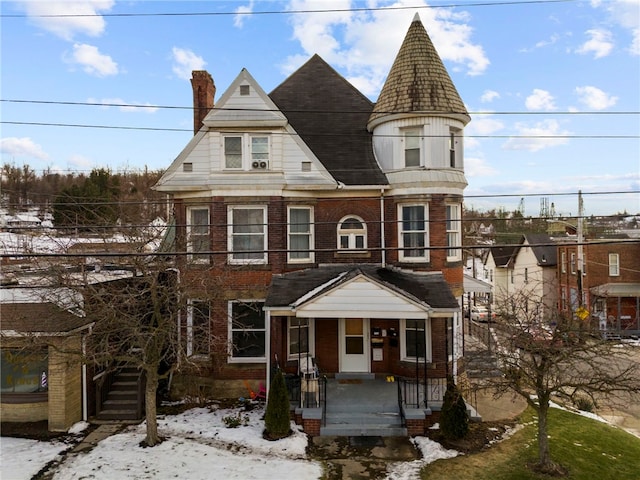 victorian home featuring covered porch