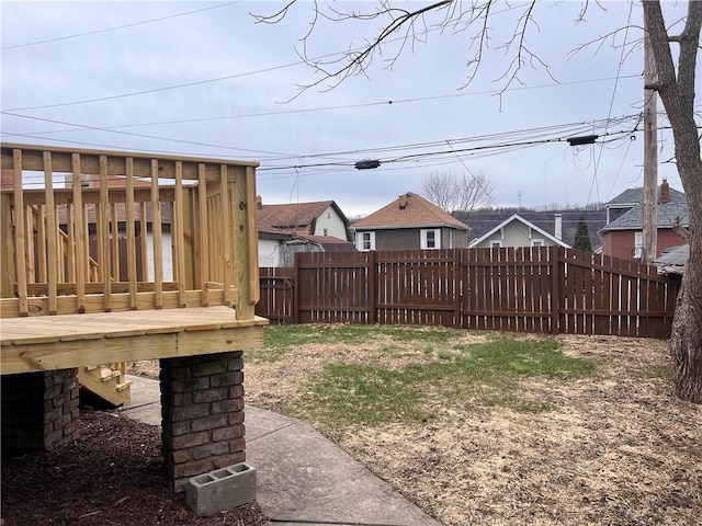 view of yard featuring a wooden deck