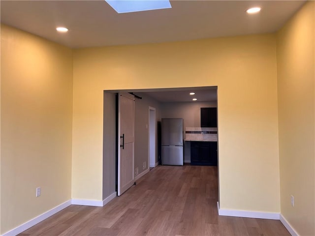 hallway featuring light hardwood / wood-style floors