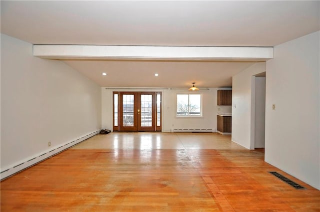 unfurnished living room with french doors, a baseboard radiator, light hardwood / wood-style floors, and beamed ceiling