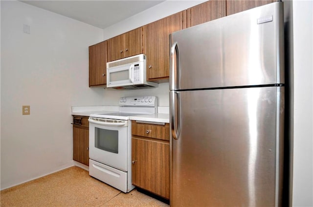 kitchen featuring white appliances