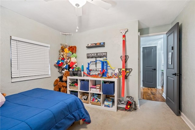 carpeted bedroom featuring ceiling fan