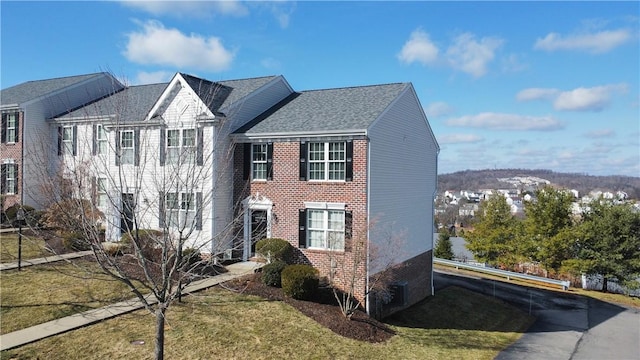 view of front of house with a front lawn