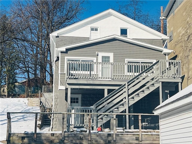 back of house with a balcony