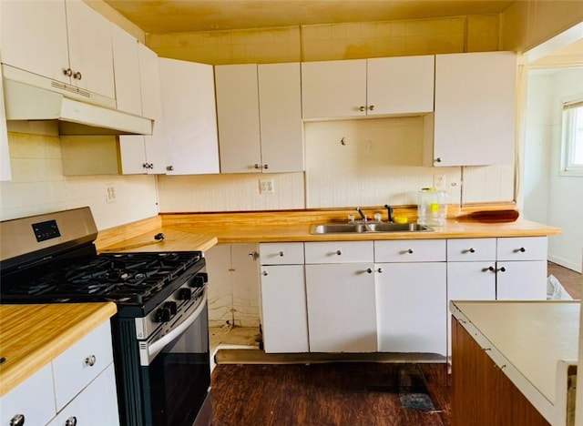 kitchen with white cabinetry, gas range, sink, and decorative backsplash