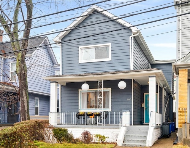 view of front of home featuring covered porch