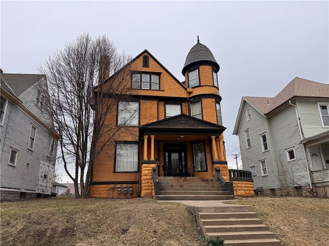 victorian home featuring covered porch