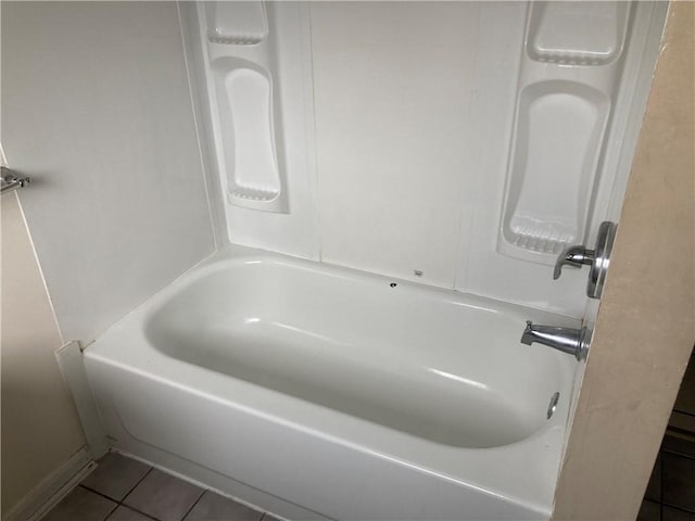 bathroom with tile patterned floors