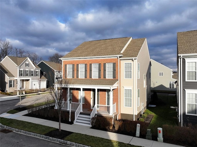 view of front of home featuring covered porch