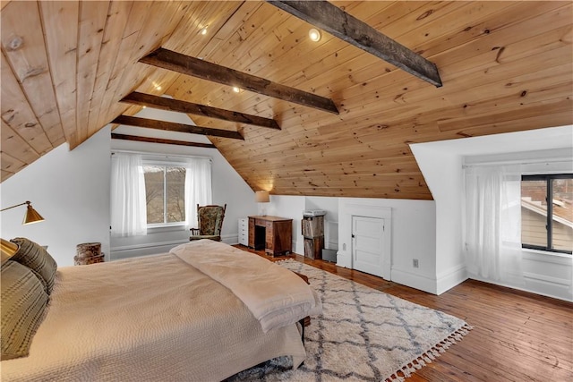 bedroom featuring hardwood / wood-style flooring, vaulted ceiling with beams, and wooden ceiling