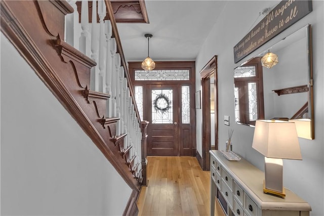 entrance foyer with light hardwood / wood-style floors