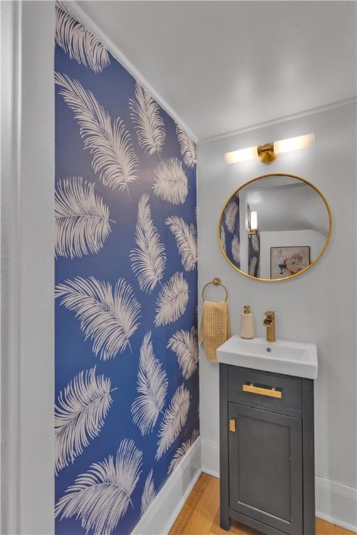 bathroom featuring vanity and hardwood / wood-style floors