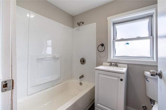 full bathroom with vanity, bathtub / shower combination, and toilet