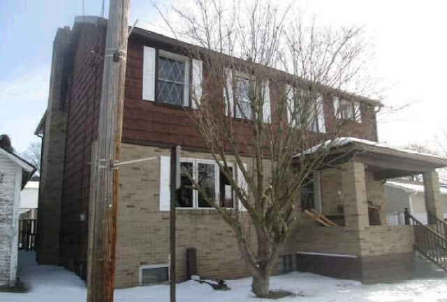 view of snow covered property