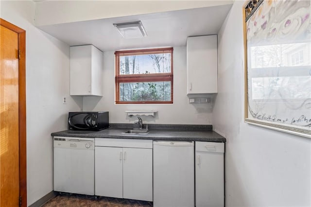 kitchen featuring white cabinets, sink, and dishwasher