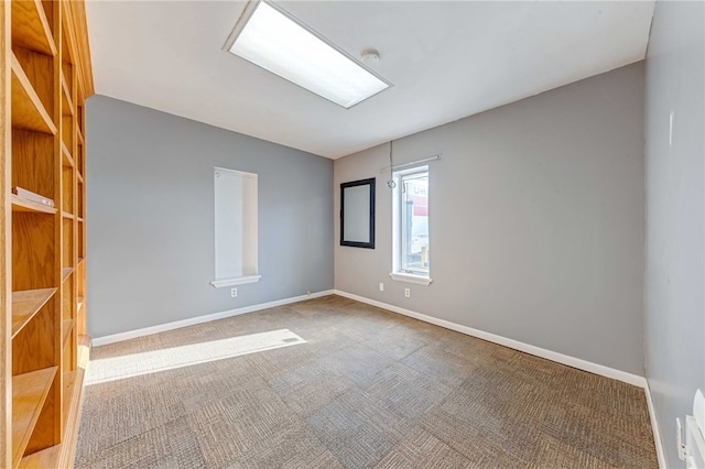 spare room with carpet flooring