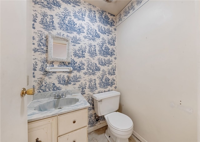 845 23rd St, Aliquippa, PA 15001 - bathroom featuring toilet, baseboards, vanity, and wallpapered walls