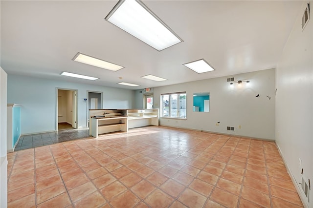 interior space with light tile patterned floors