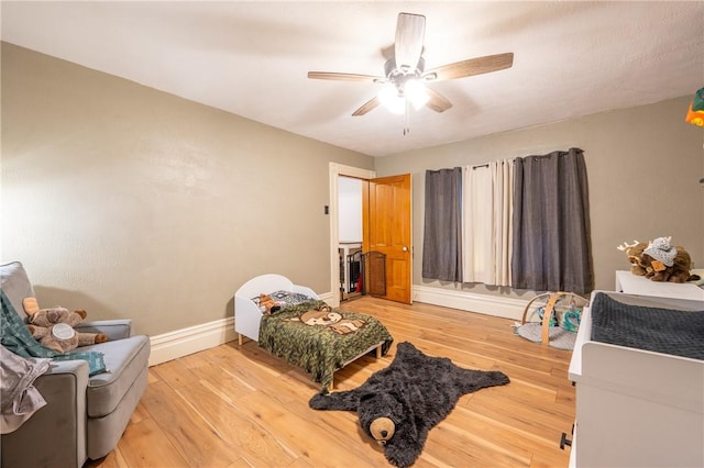 bedroom featuring ceiling fan and wood-type flooring