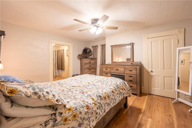 bedroom featuring ceiling fan and light hardwood / wood-style floors