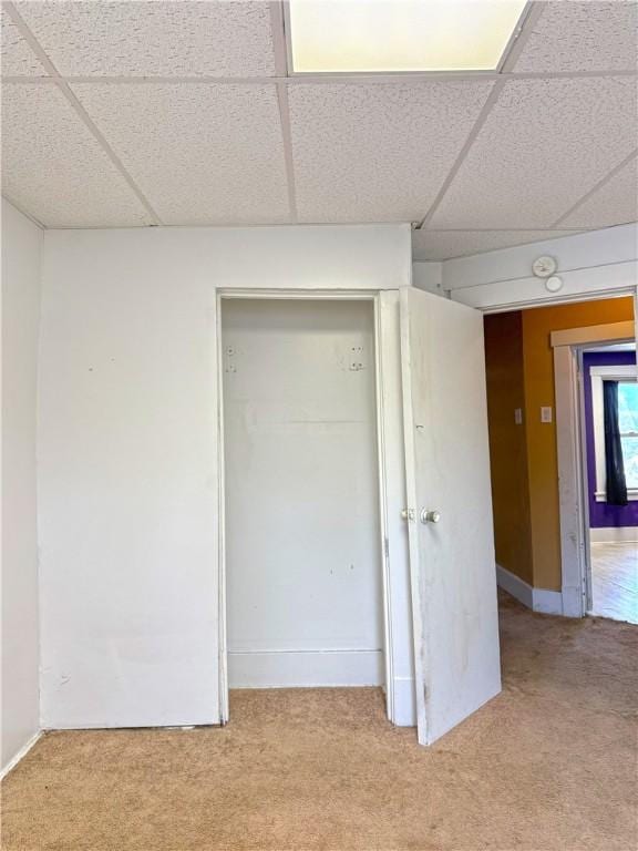 interior space featuring a paneled ceiling