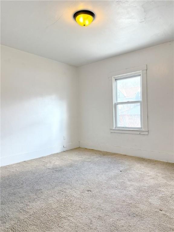 empty room featuring carpet floors