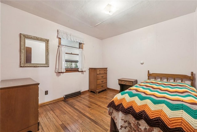 bedroom with light hardwood / wood-style flooring