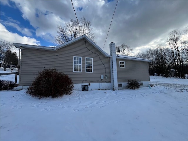 view of snow covered property