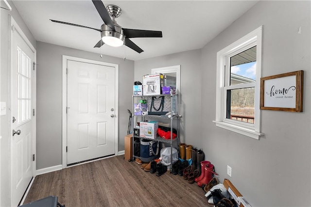 interior space with wood-type flooring and ceiling fan