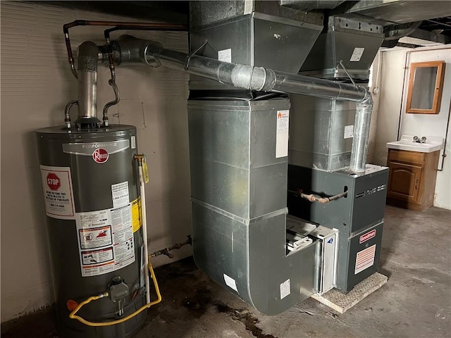 utility room featuring water heater and sink