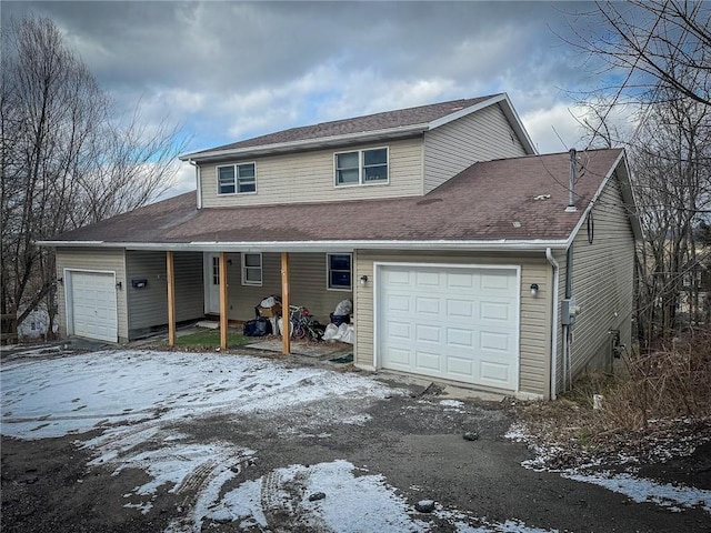 view of front of property featuring a garage