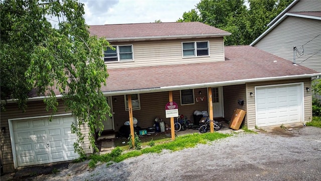 716-718 Hettie Way, City Of But Sw, PA 16001 - view of front of property with driveway, a shingled roof, and a garage