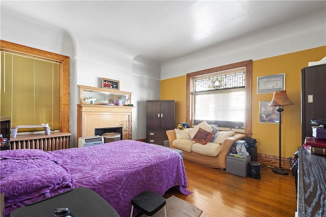 bedroom with light hardwood / wood-style floors