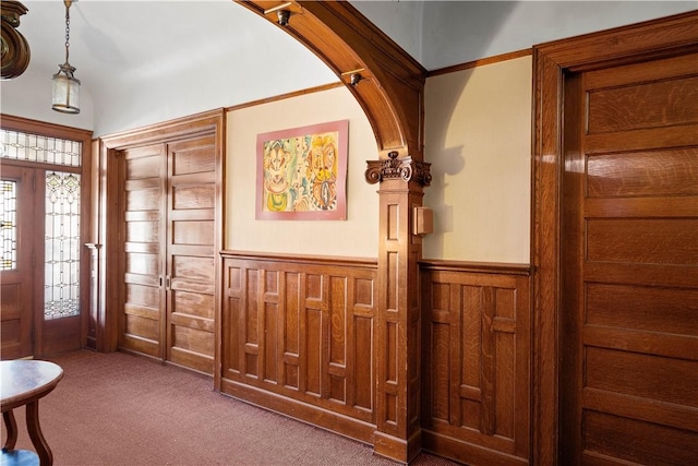 view of carpeted entrance foyer