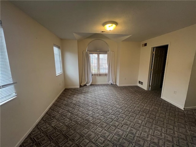 view of carpeted spare room