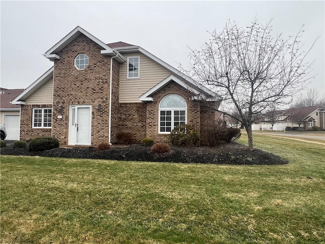 front facade featuring a garage and a front yard