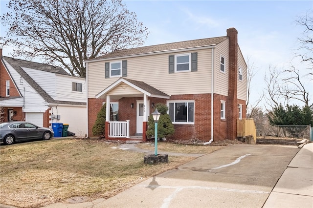 view of front facade with a garage and a front yard