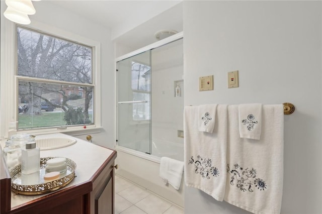 bathroom with vanity, tile patterned floors, and shower / bath combination with glass door