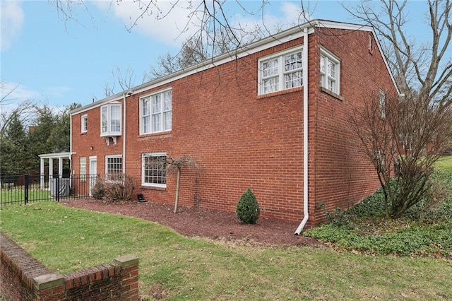 view of home's exterior featuring a yard