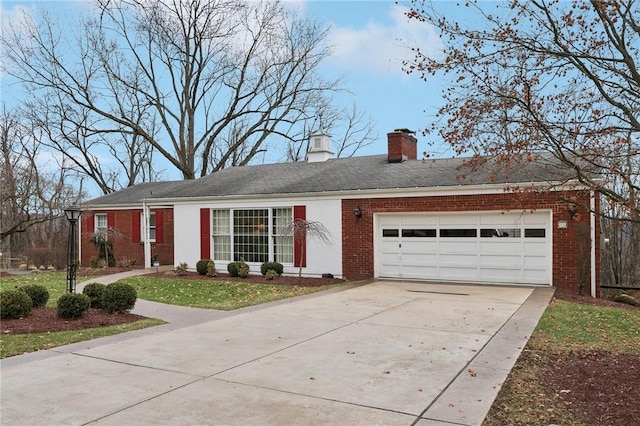 single story home featuring a garage