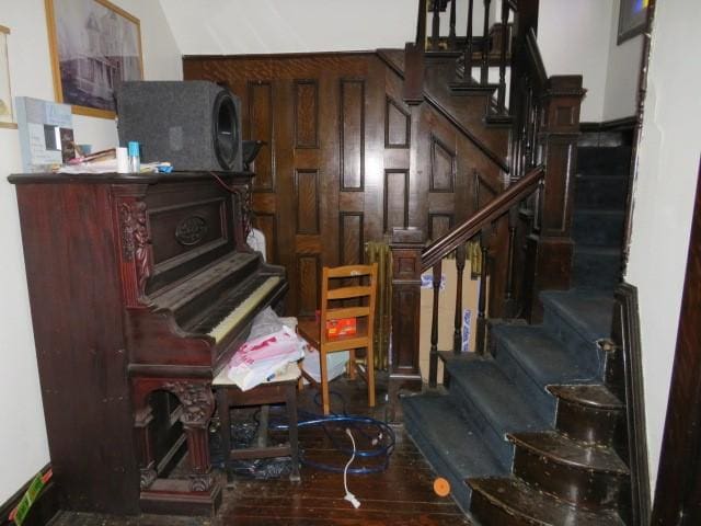 miscellaneous room featuring dark hardwood / wood-style flooring