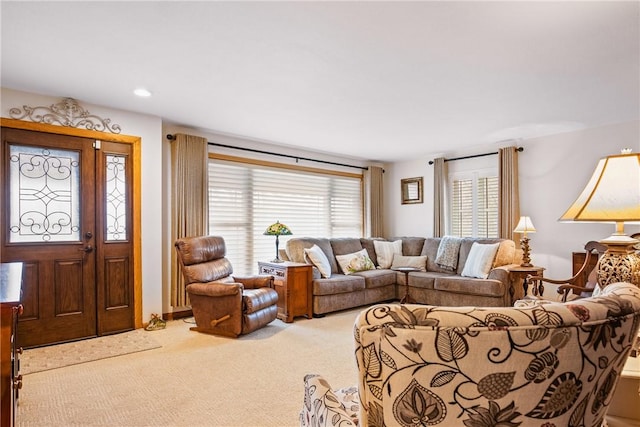 living room featuring light carpet