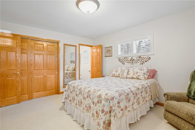 bedroom featuring carpet floors and a closet