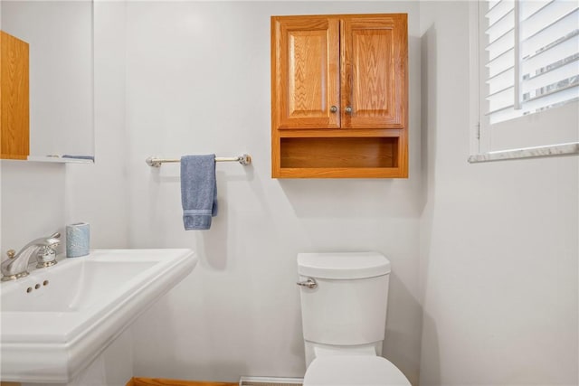 bathroom with sink and toilet