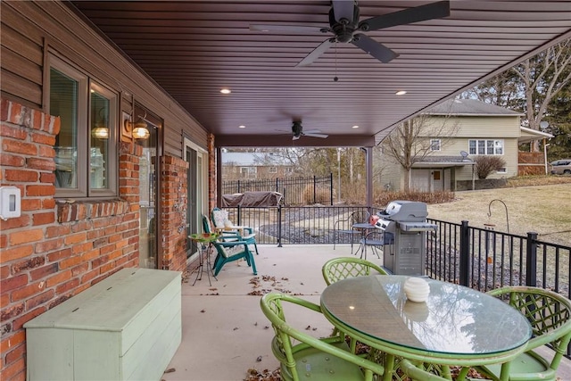 view of patio with grilling area and ceiling fan