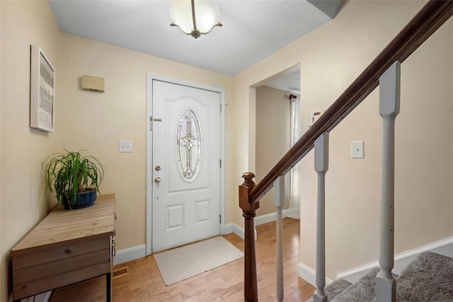 foyer featuring light hardwood / wood-style floors