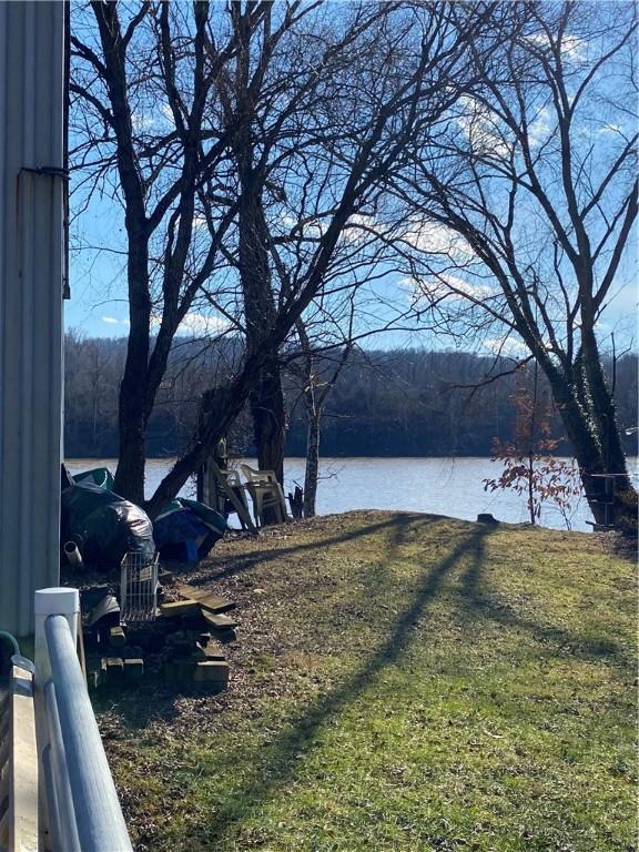 view of yard with a water view