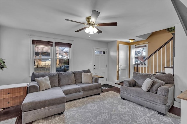 living room with ceiling fan and hardwood / wood-style floors