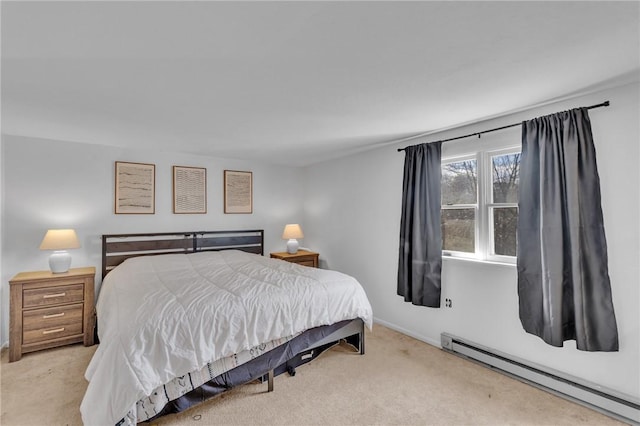 carpeted bedroom featuring a baseboard radiator